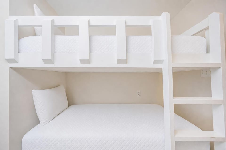Bunk beds in this sleeping area offer a cozy spot to dream after a day of beachside fun