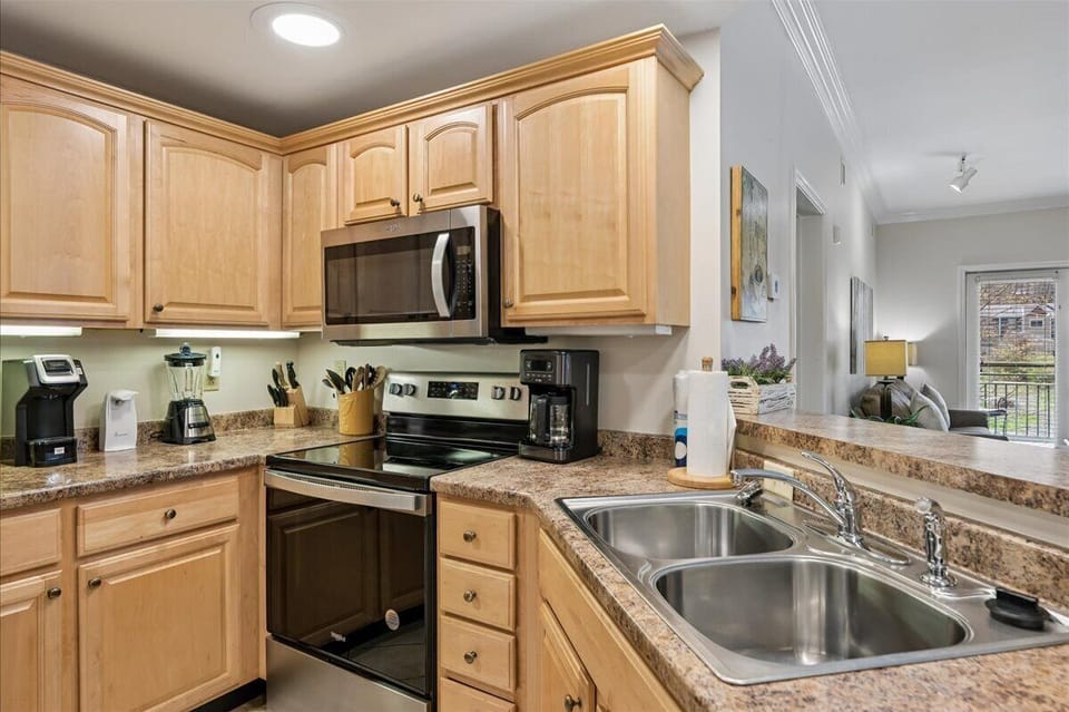 Your fully equipped kitchen awaits with granite counters, stainless appliances, and everything you need to create delicious home-cooked meals during your stay.
