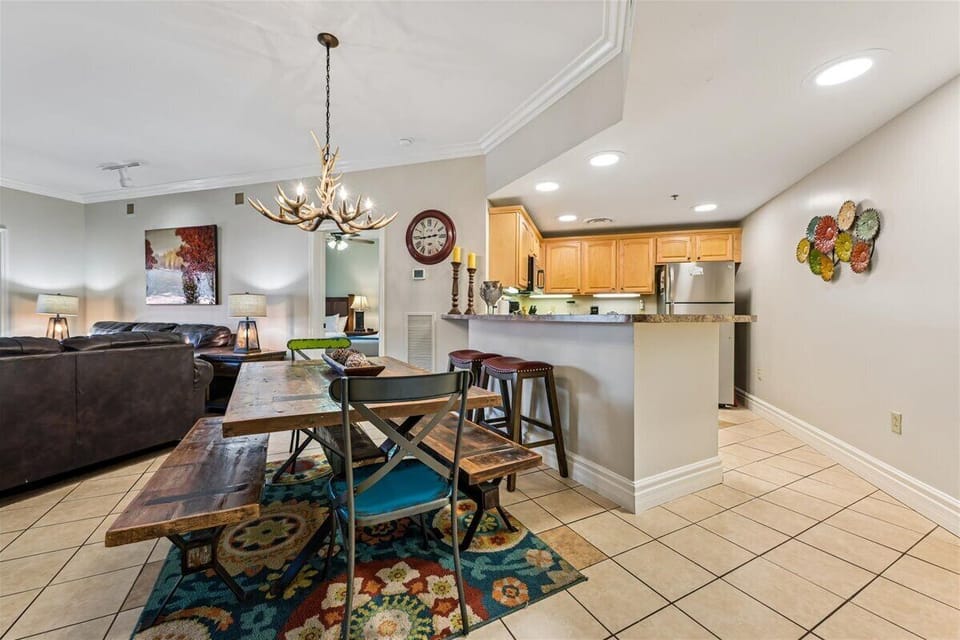 Gather around your spacious dining table while the chef prepares meals in your fully-equipped kitchen just steps away.