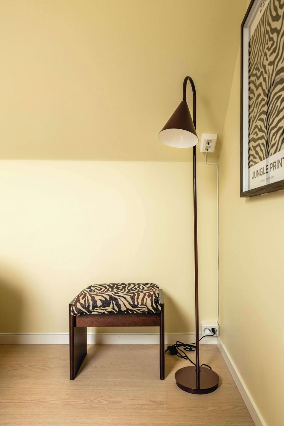 Quiet corner with a comfortable chair, perfect for relaxing with a book.