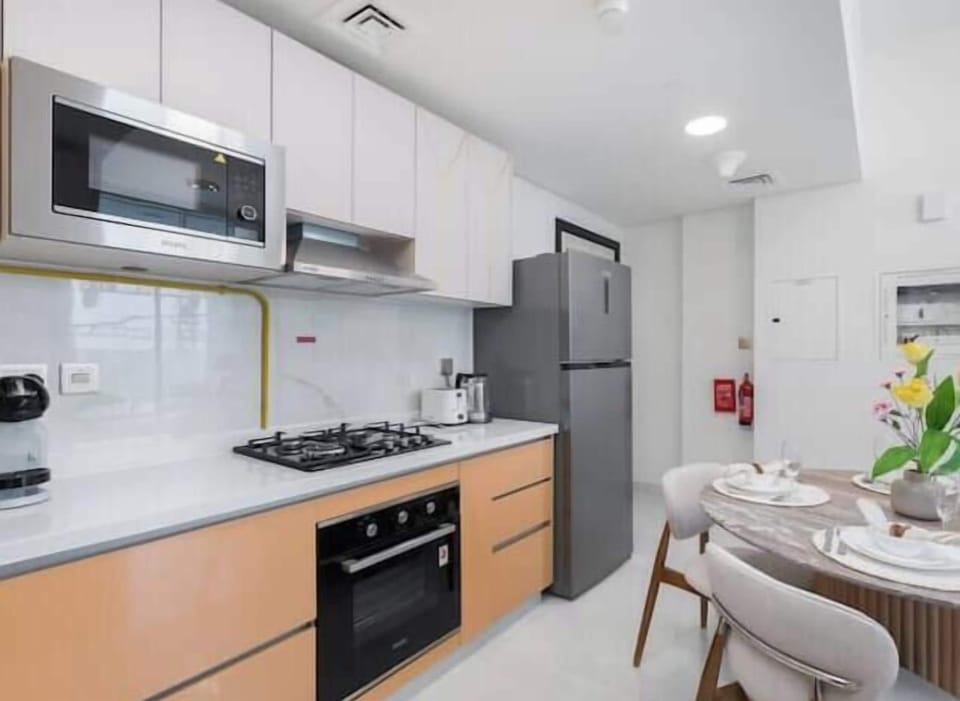 Luxury Apartment, Balcony, City View | Private kitchen | Full-size fridge, microwave, oven, stovetop