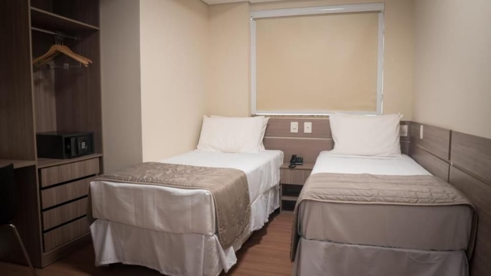 In-room safe, laptop workspace, blackout drapes, soundproofing
