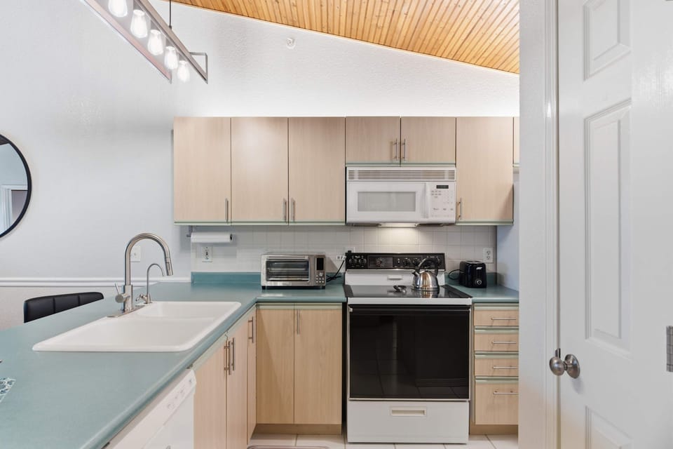 The open kitchen is well equipped for an unforgettable getaway​