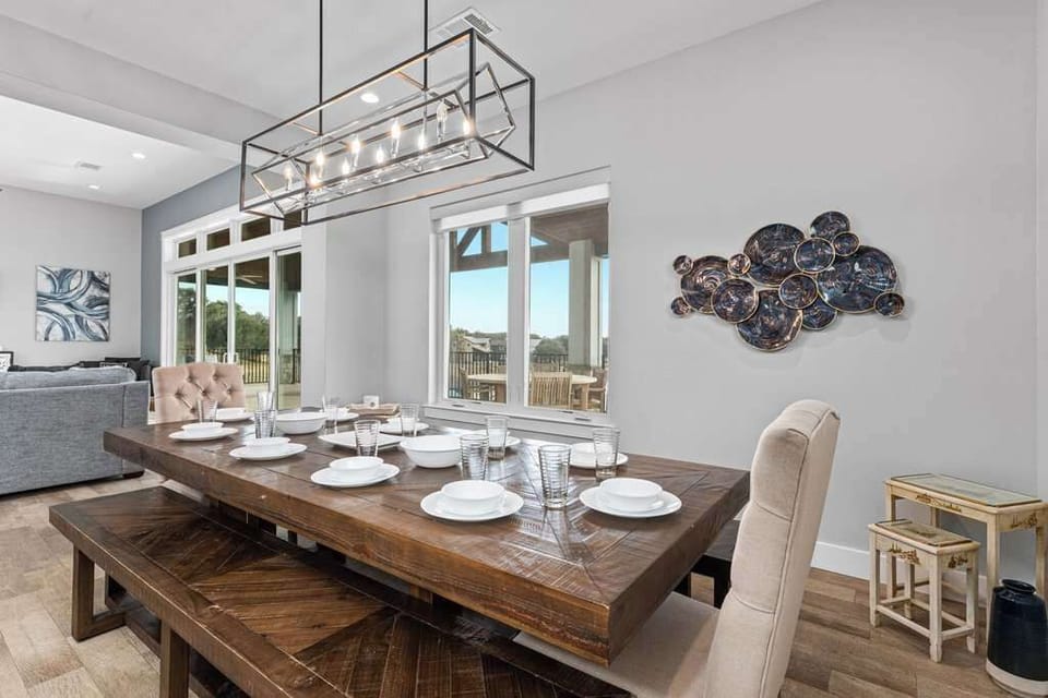 Enjoy meals together in this spacious, light-filled dining area.