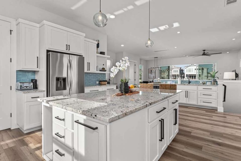 Stylish kitchen with plenty of prep space.