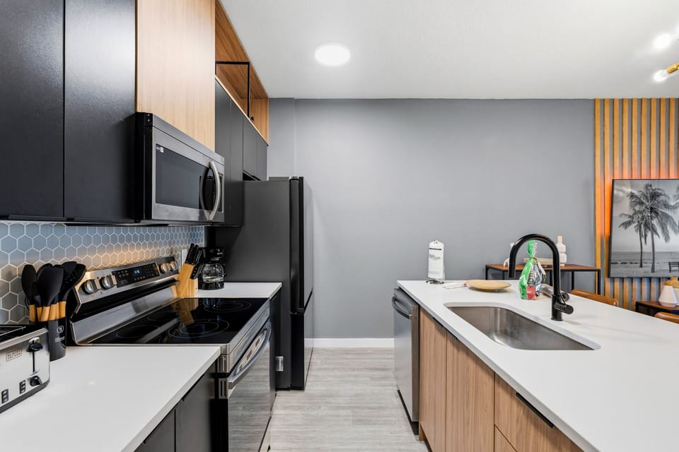 Fully equipped kitchen with modern appliances and spacious layout