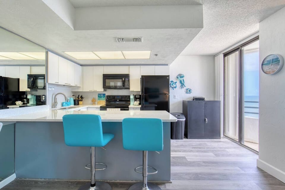 Daytona Beach Vacation Rental Oceanfront Airbnb VRBO  Private Access Game Room  Patio balcony