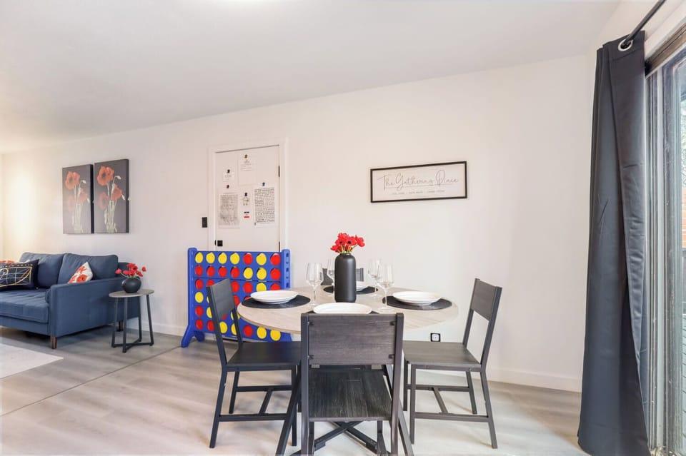 Open dining space connected to the living room, perfect for shared meals, games, or casual gatherings