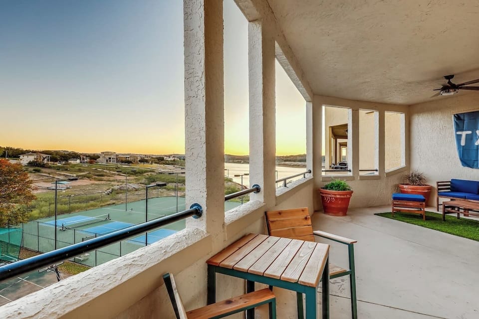 Multiple Seating Areas on Patio with Lake Views