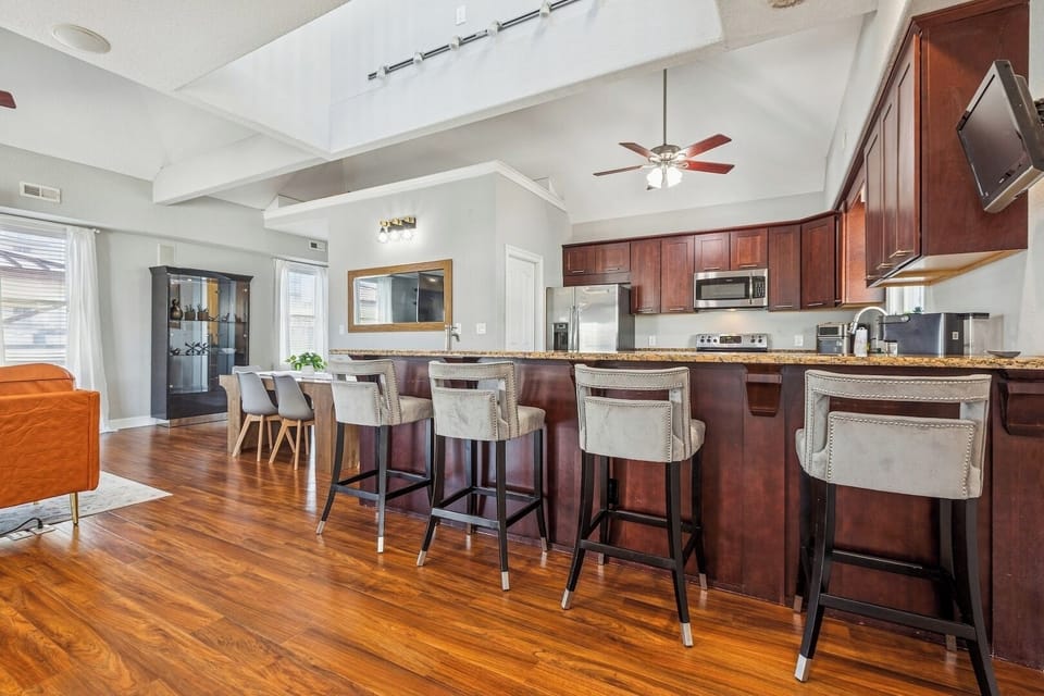 Plenty of seating for everyone. With spacious bar seating at the kitchen island plus a separate dining table, there’s room for the whole group to gather, dine, and connect comfortably.