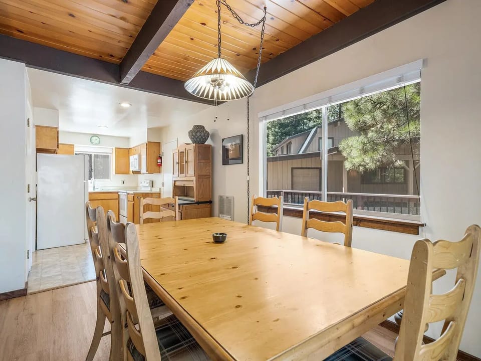 Dining and kitchen area. Laundry room room and Master bedroom off kitchen.