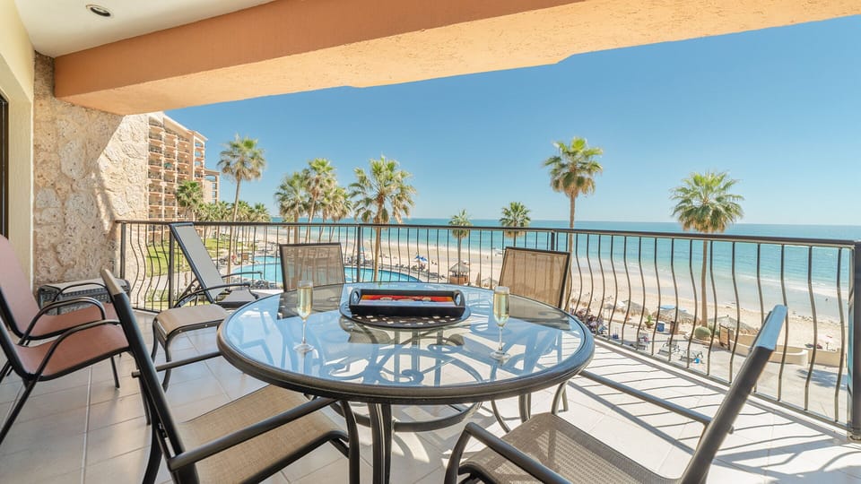 Large balcony and dining table.