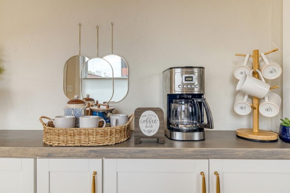 Sweet little coffee bar setup with mugs and essentials to start your morning!