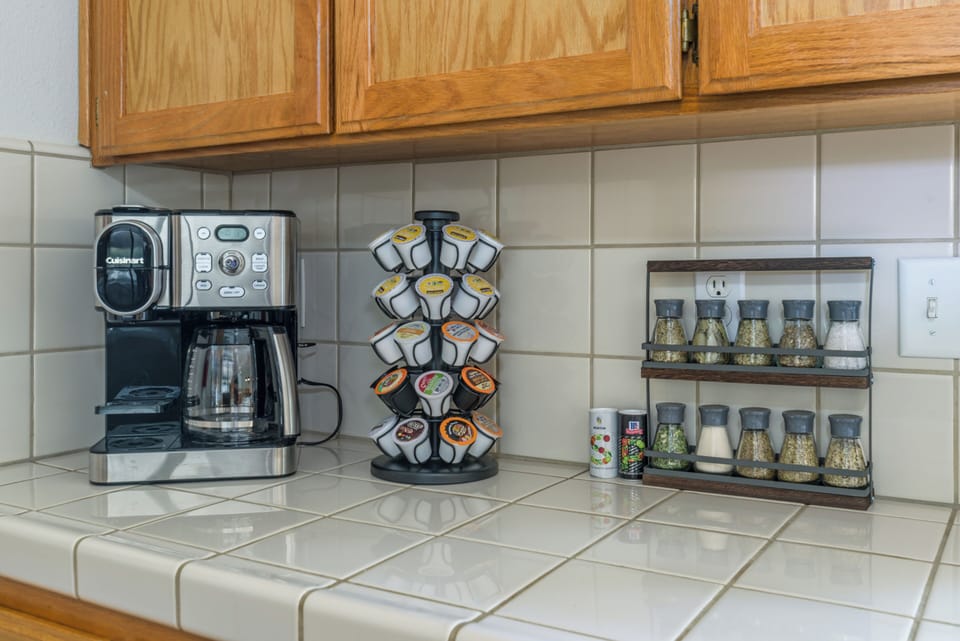 Complementary Keurig coffee pods, teas, sugar, creamer. Pepper, salt, spice rack