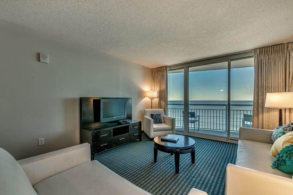 Spacious living room with stunning ocean views and bright, airy ambiance