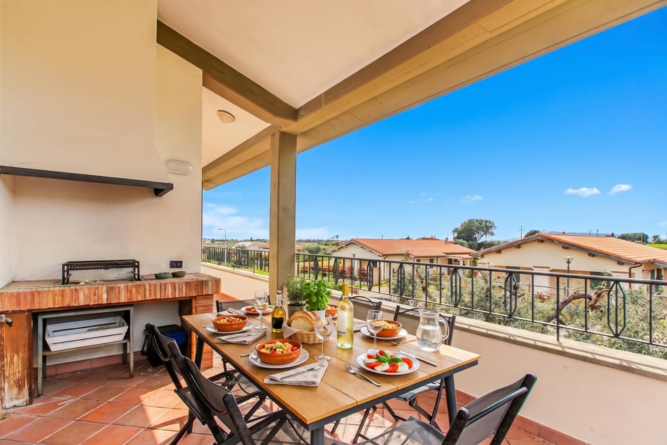 Family Apartment, 4 Bedrooms, Balcony (Villa Adriana Capalbio with A/C, BBQ) | Outdoor dining