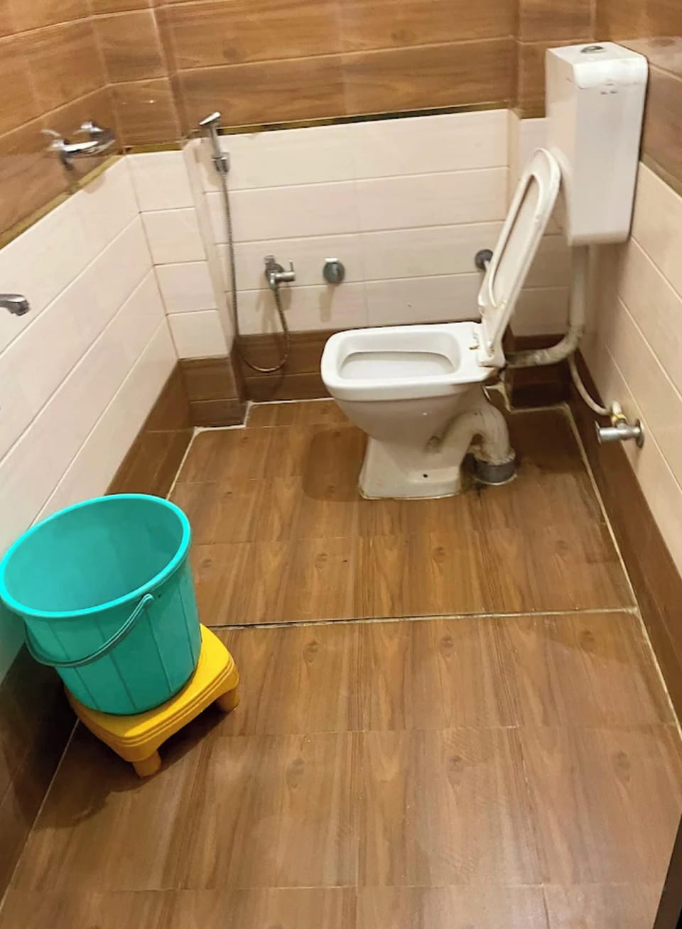 Shower, rainfall showerhead, slippers, towels