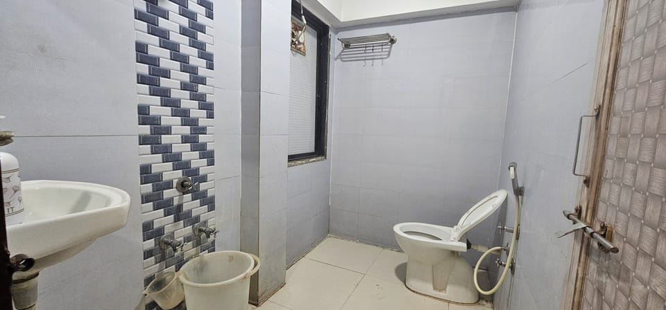 Deluxe Double Room, City View | Bathroom | Free toiletries, slippers, towels, soap