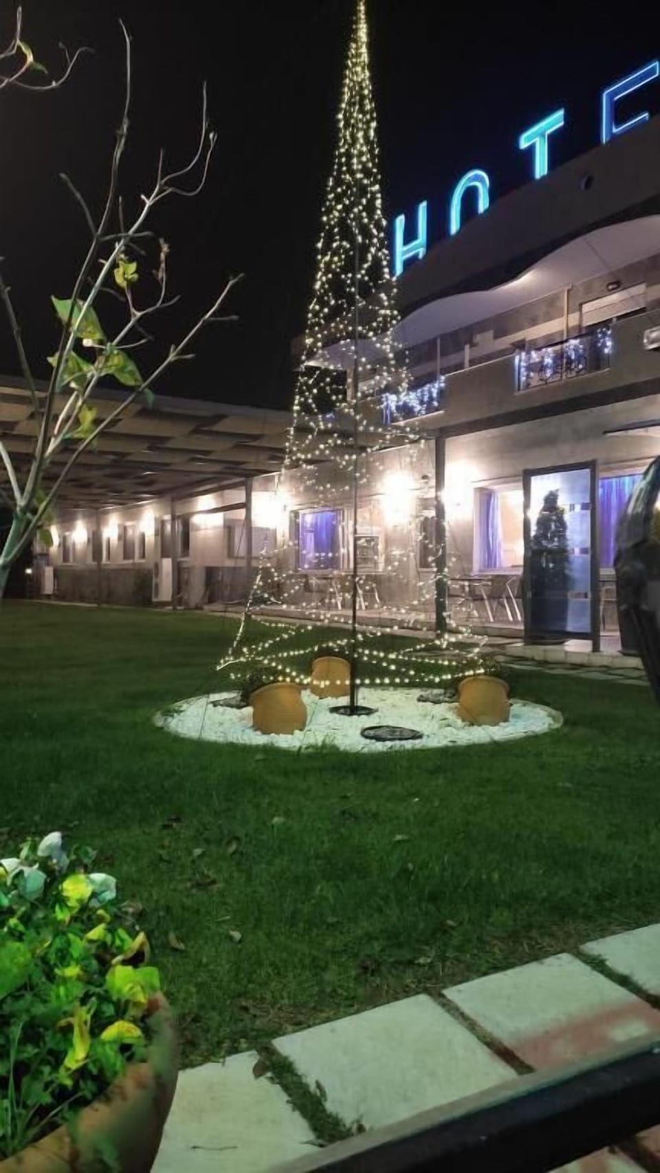 Hotel exterior illuminated at night