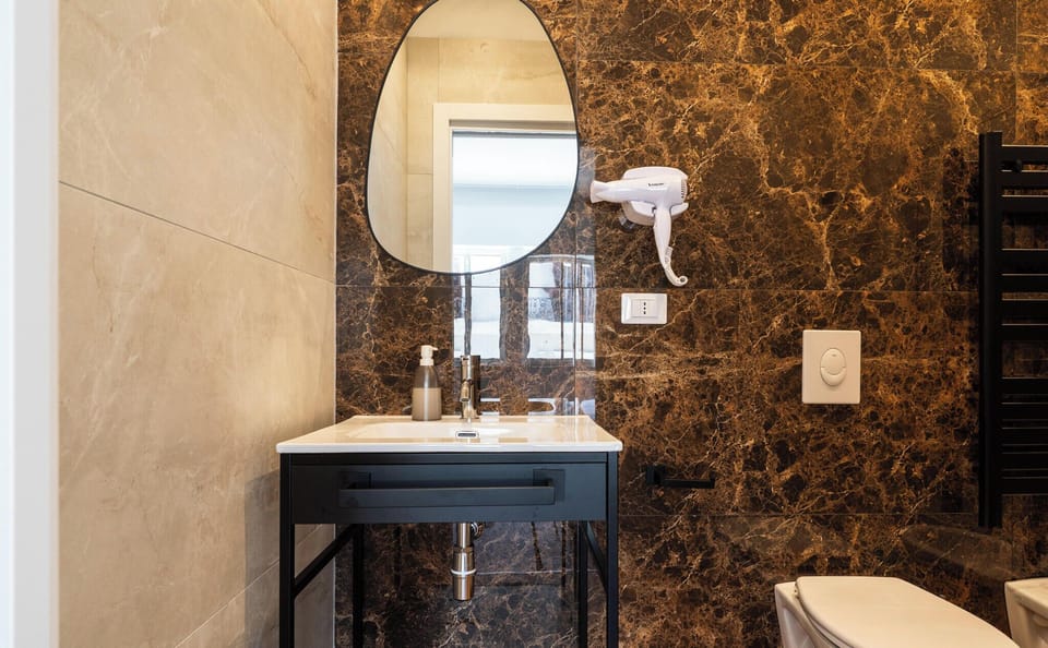 Superior Triple Room | Bathroom | Shower, hair dryer, towels, soap