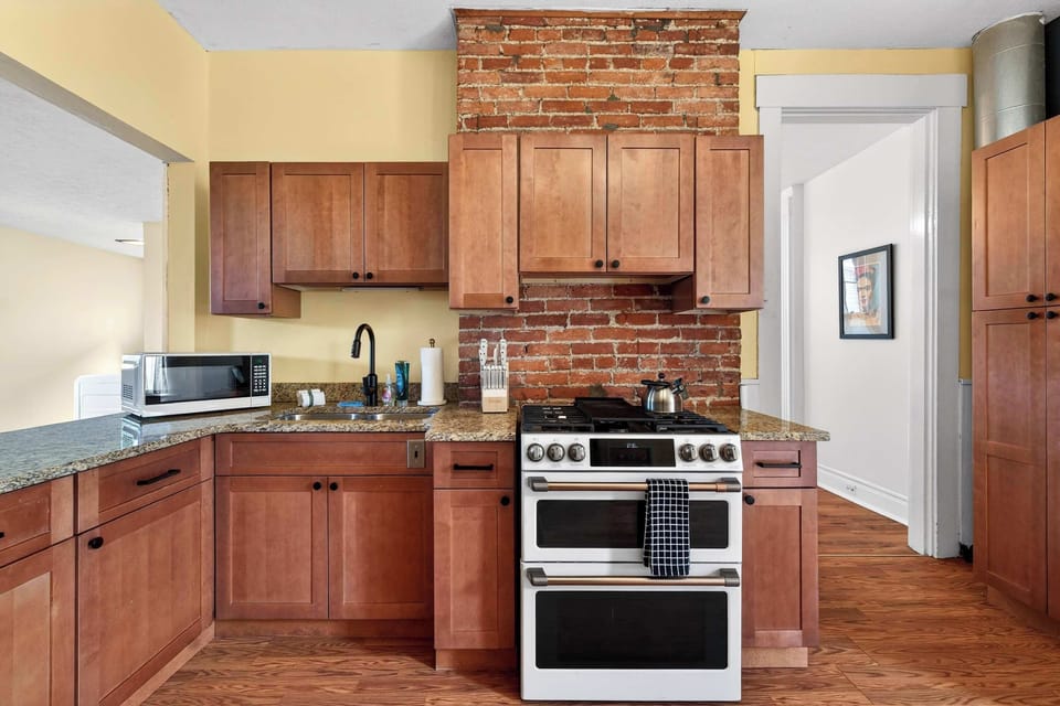 Kitchen: A bright kitchen perfect for cooking and gathering.