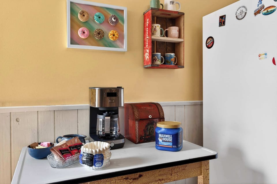 Kitchen: A bright kitchen perfect for cooking and gathering.