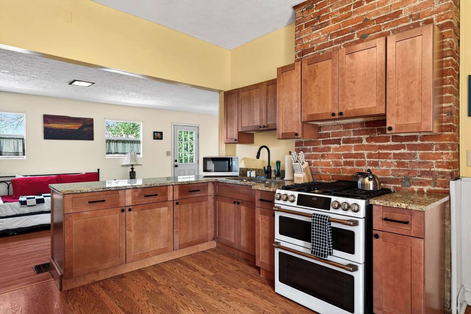 Kitchen: A bright kitchen perfect for cooking and gathering.