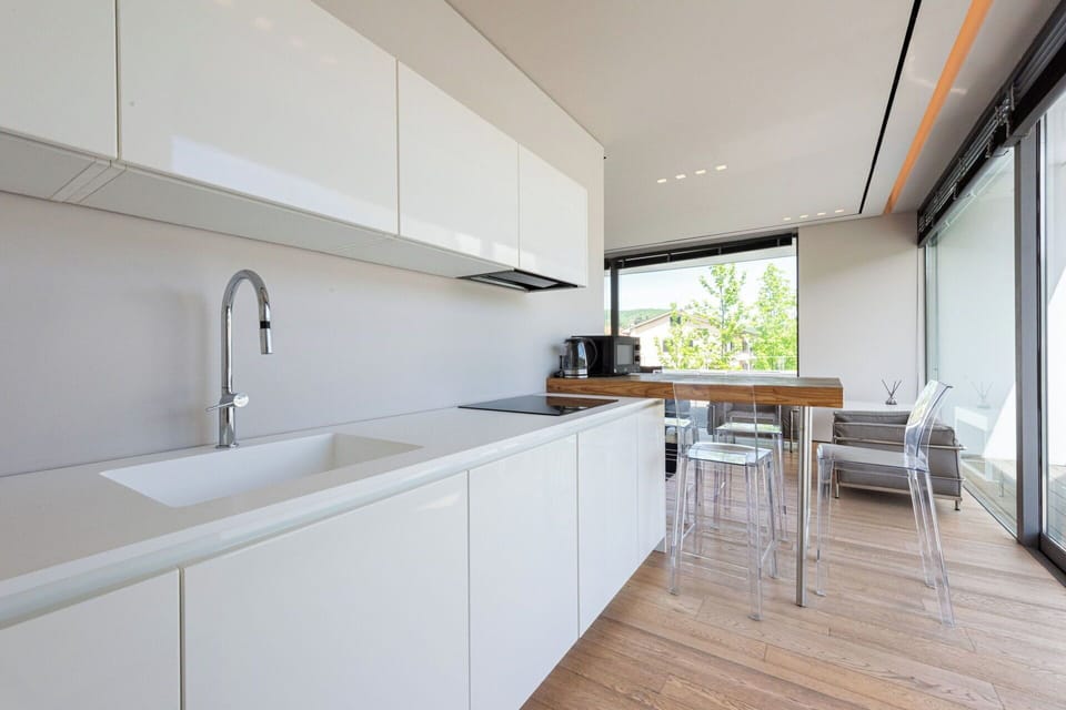 Countertop, Kitchen, Interior Design, Furniture, Flooring, Wood, Cabinetry, Floor, Ceiling, Home