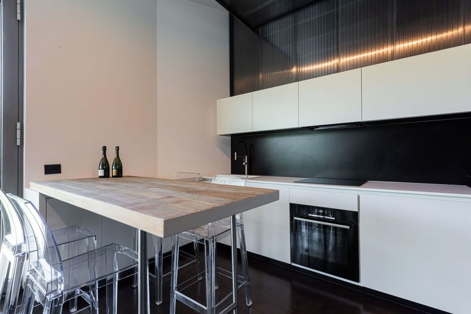 Furniture, Interior Design, Kitchen, Flooring, Countertop, Wood, Kitchen Appliance, Floor, Ceiling, Lighting