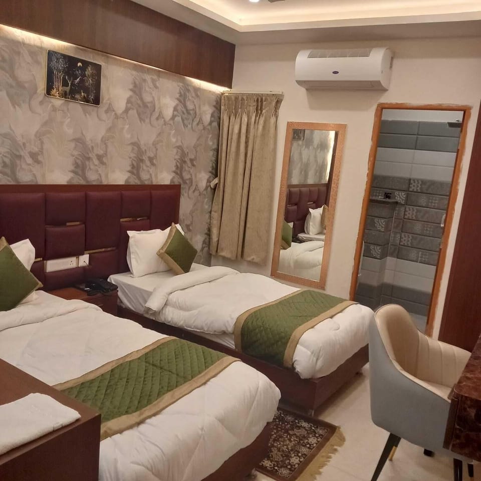 Deluxe Room | Premium bedding, memory foam beds, desk, laptop workspace