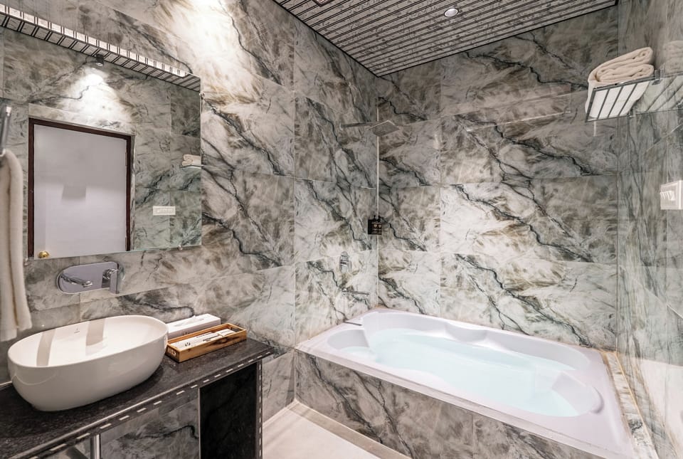 Shower, free toiletries, slippers, bidet