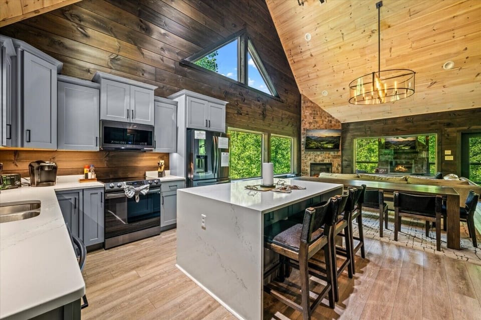 Soaring ceilings, natural light, and an open floorplan create a welcoming space for memorable moments with family and friends.