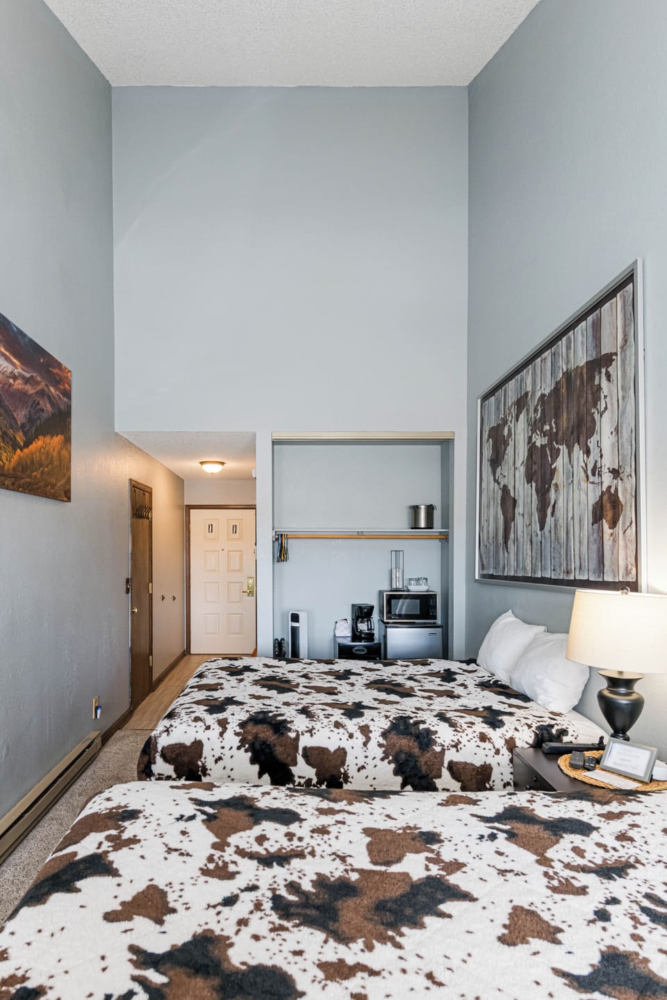 Settle into your cozy retreat at 645 SilverCreek Inn with comfortable beds and convenient kitchenette featuring microwave and coffee maker for easy morning starts.