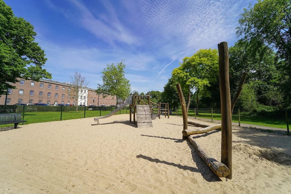 Let kids play freely on the sunny sand playground.