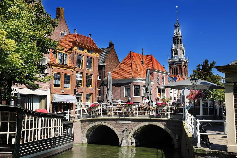 Stroll to charming canalside cafés and historic city scenery.