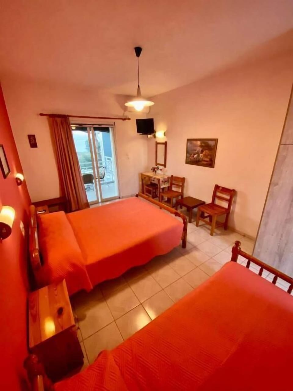 Inviting Bedroom with Balcony Access and Cozy Layout