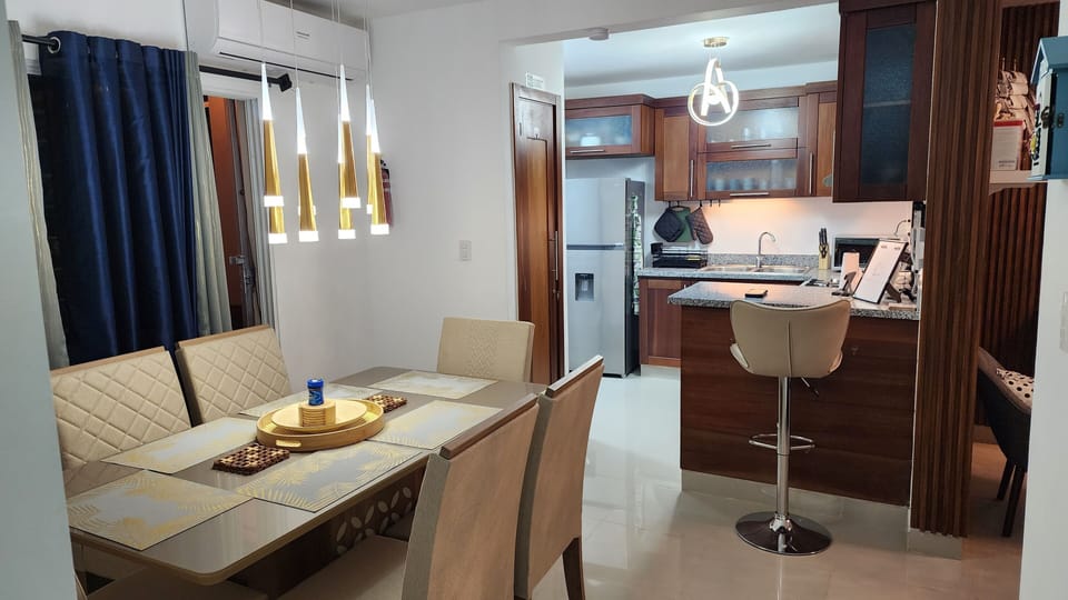 Dining room, kitchen view. 