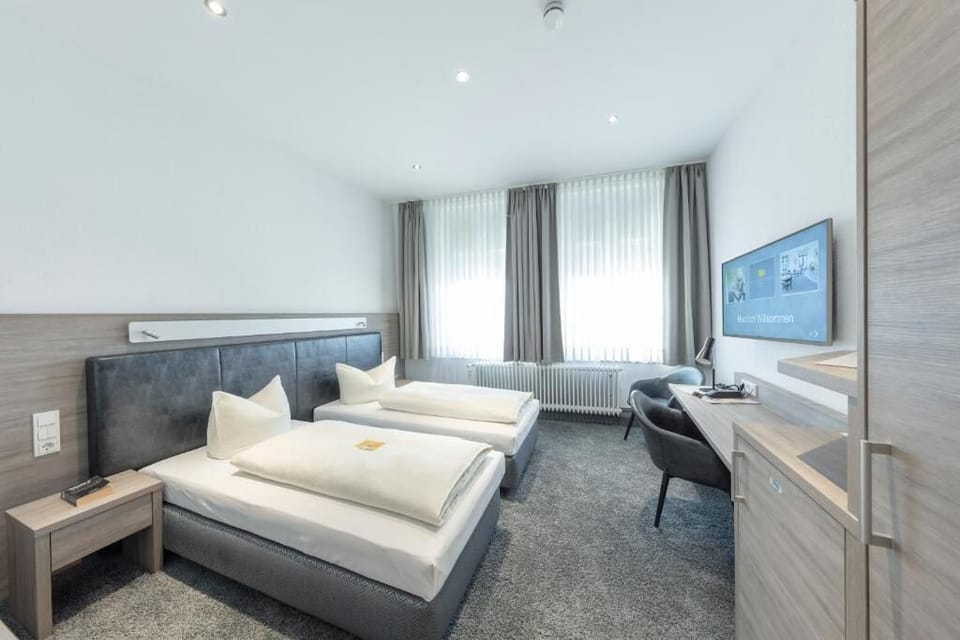 Down comforters, minibar, desk, blackout drapes