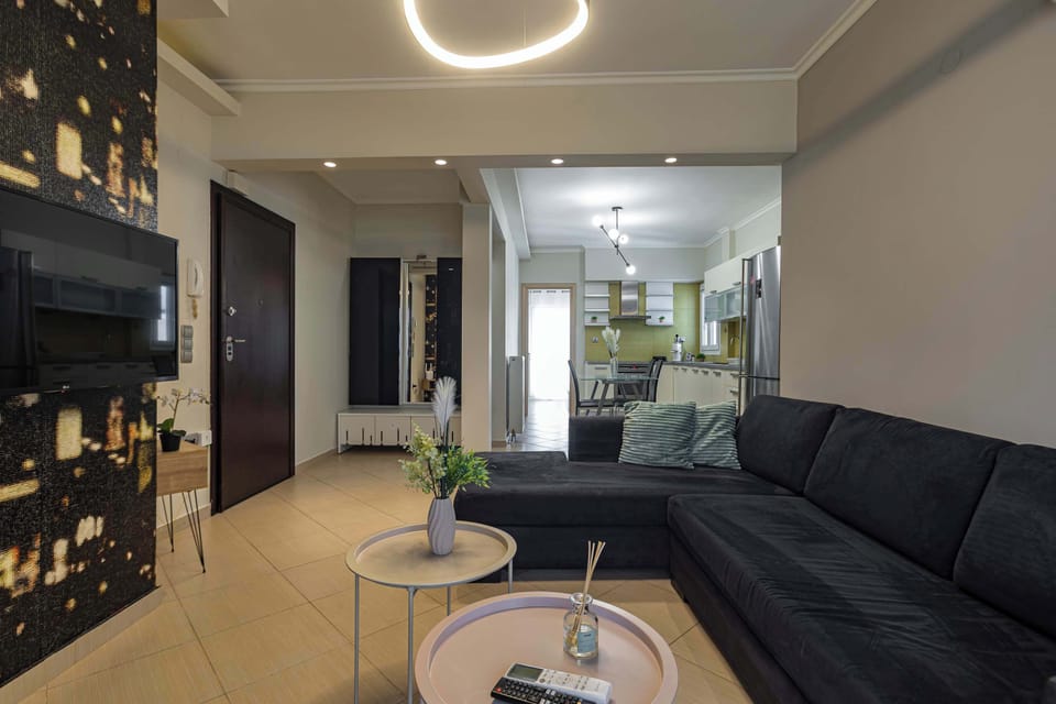 Stylish lounge with modern furnishings, coffee tables, and cozy ambiance.