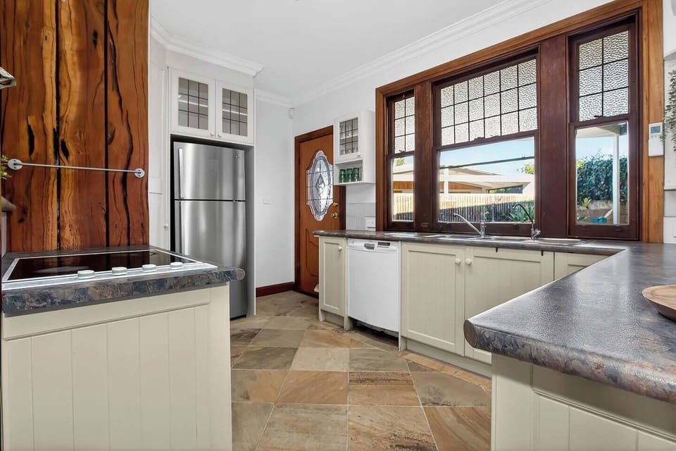 Cook with ease in the full kitchen, where generous bench space, modern appliances and a Nespresso coffee machine make both quick breakfasts and shared dinners simple.