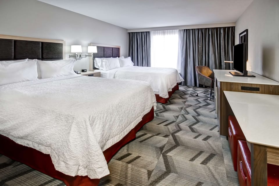 Room, 2 Queen Beds, Non Smoking, Refrigerator | In-room safe, desk, laptop workspace, iron/ironing board