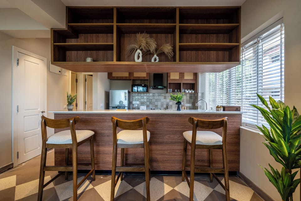 Apartment, 3 Bedrooms, Balcony | Private kitchen | Electric kettle, dining tables
