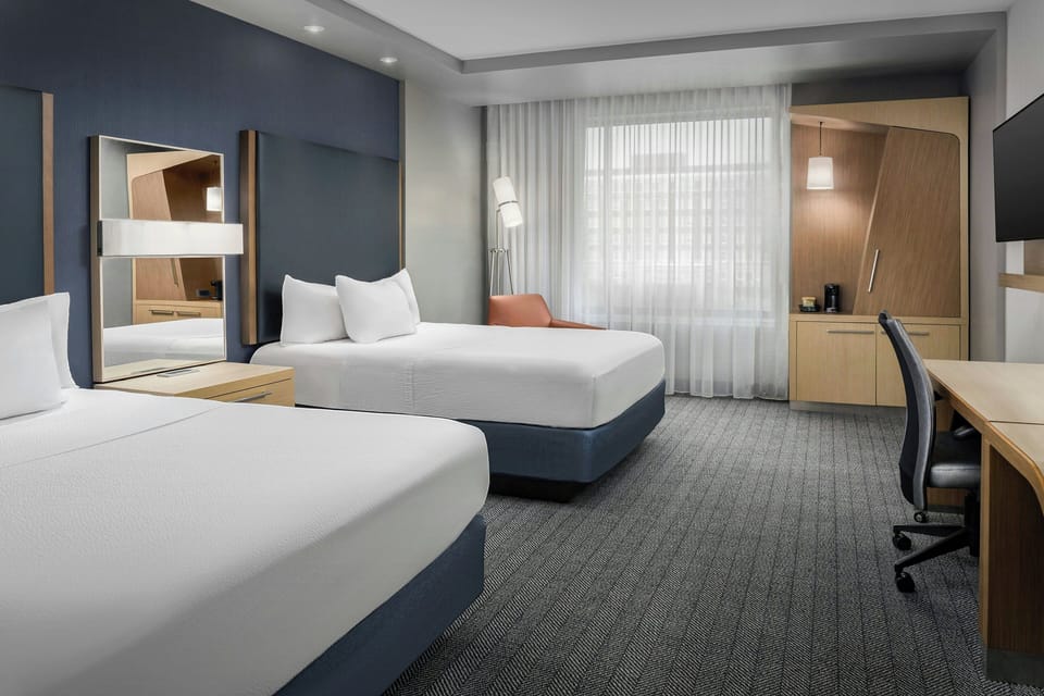 Room, 2 Queen Beds | In-room safe, desk, iron/ironing board, free cribs/infant beds