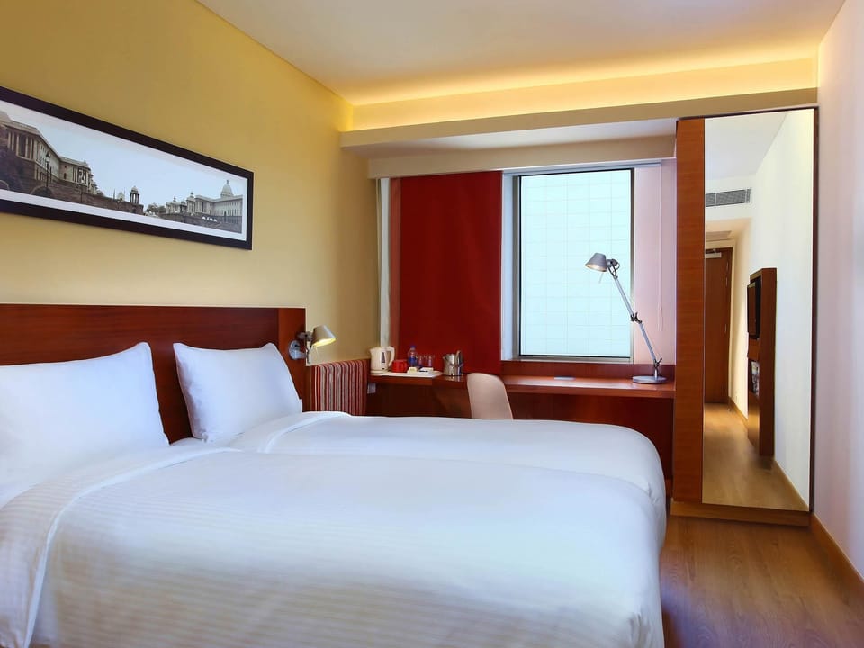 Premium bedding, memory foam beds, in-room safe, desk