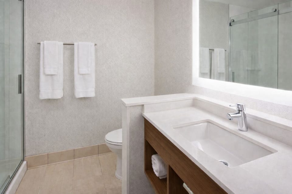Rainfall showerhead, free toiletries, hair dryer, towels