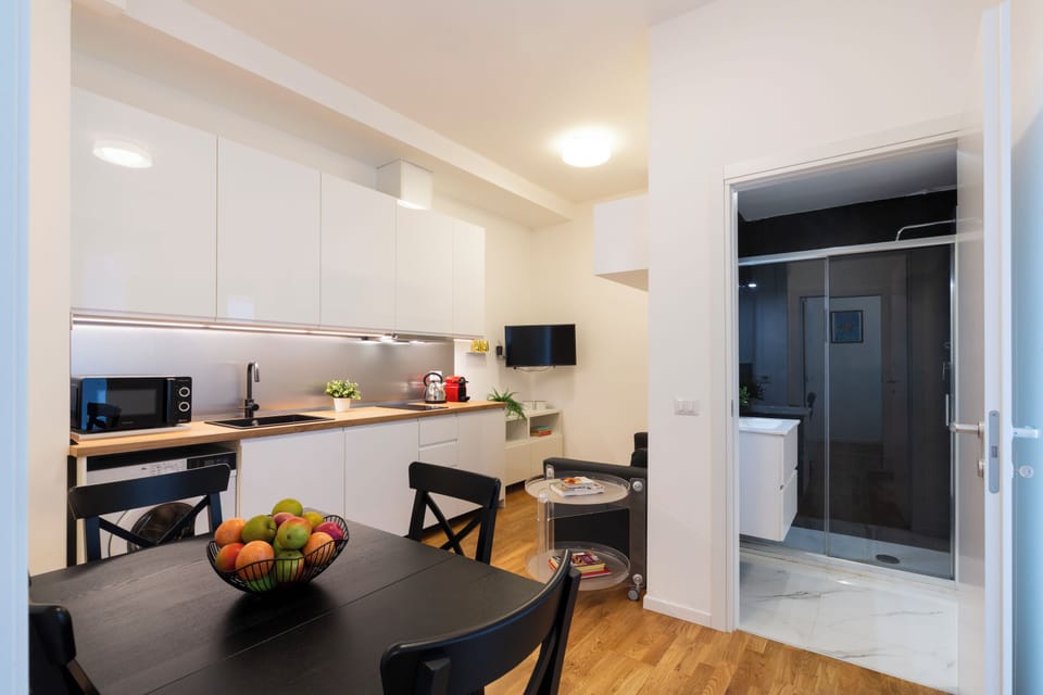 Comfort Apartment, Balcony | Living area | 32-inch Smart TV with digital channels