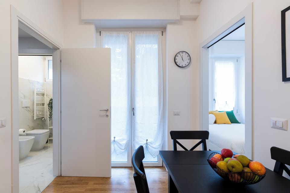 Comfort Apartment, Balcony | Living area | 32-inch Smart TV with digital channels