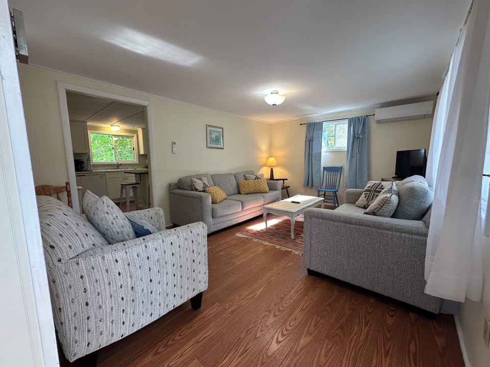 Sink into plush seating and enjoy your spacious retreat with warm wood floors, natural light, and modern comforts.