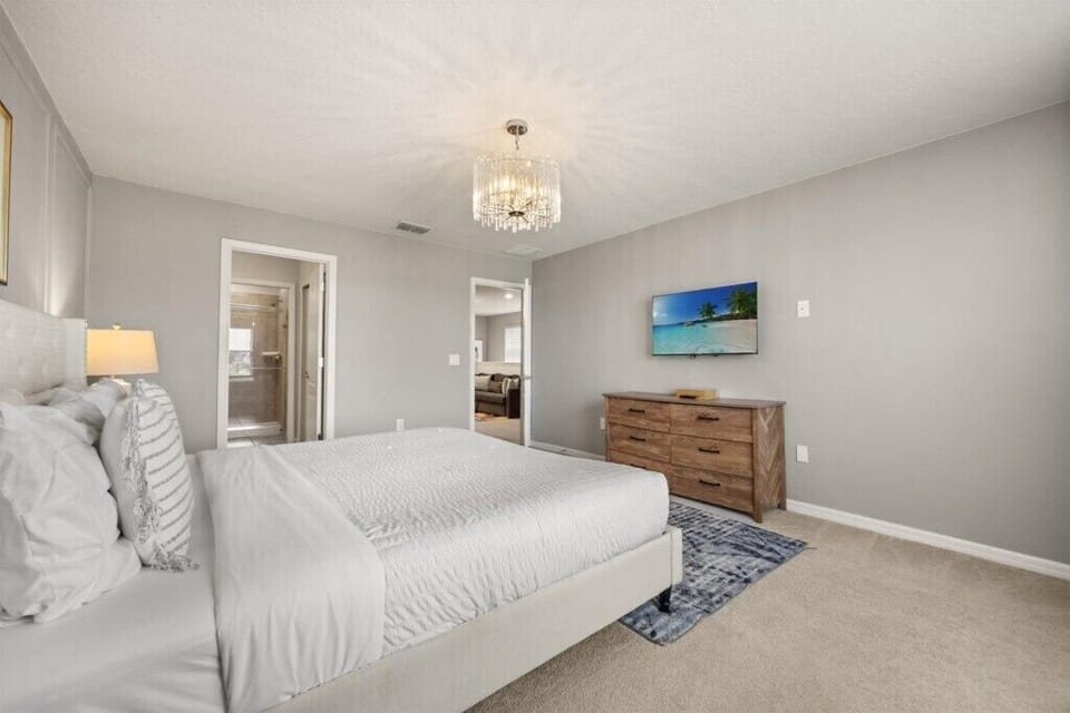 OWNER'S SUITE (2nd Floor):  1 King Bed with 43” Flat Screen TV and Ensuite Bathroom (O. BATH) 
