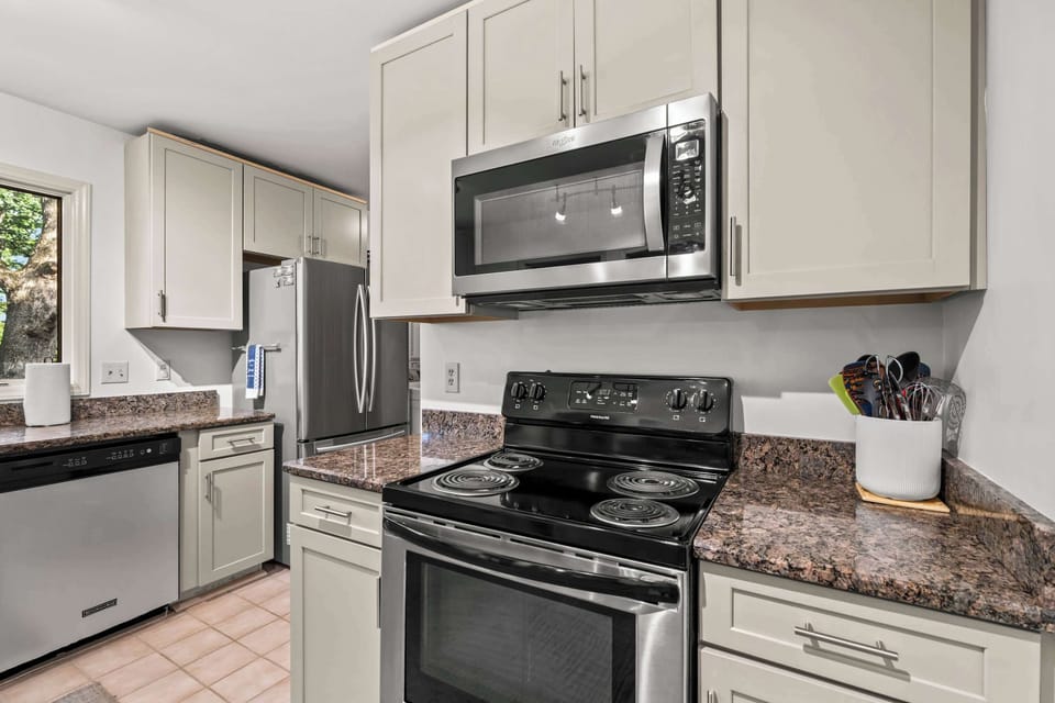 Bright Kitchen with Stainless Steel Appliances